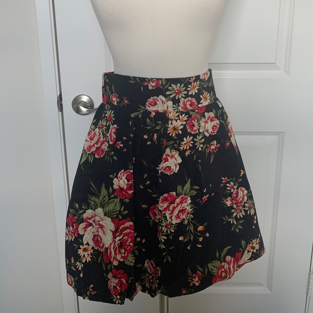 Black floral print shirt.